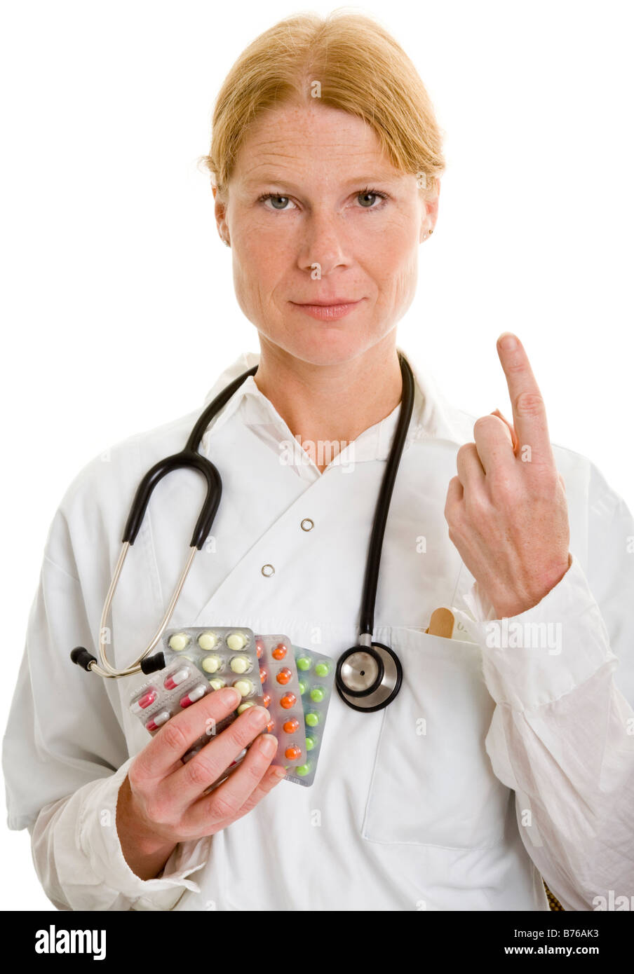 Ärztin zeigt Medikamente und droht mit dem zeigefinger Foto de stock