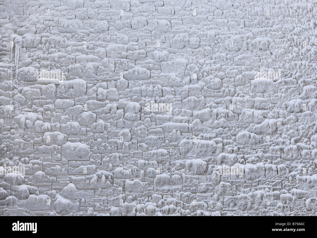 Muro de piedra congelada Foto de stock