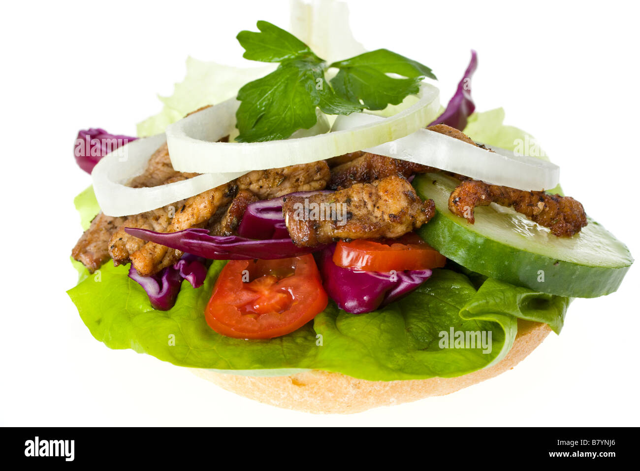 Doner kebab sandwich aislado en blanco Foto de stock