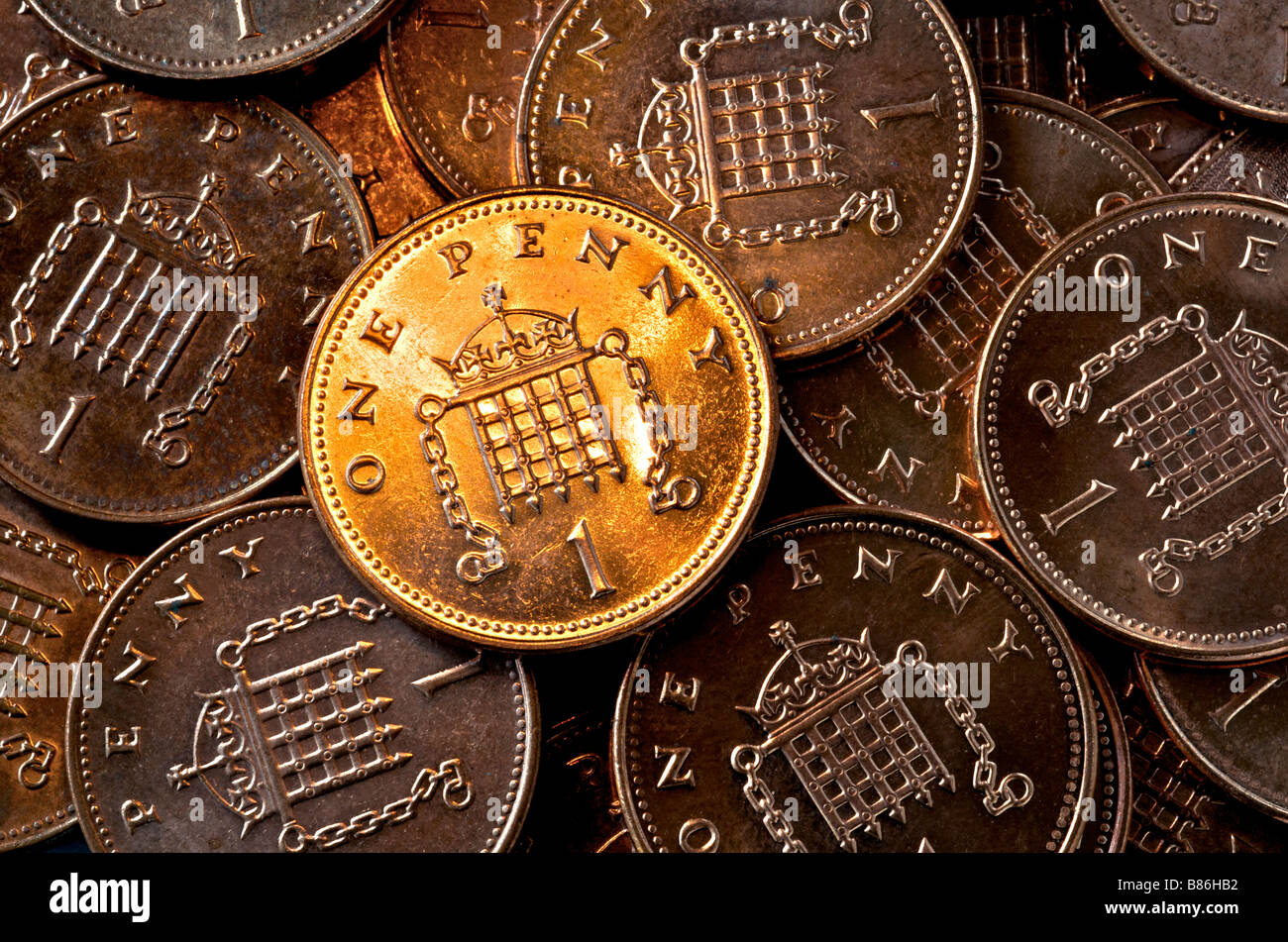 Las monedas de un centavo británico Foto de stock