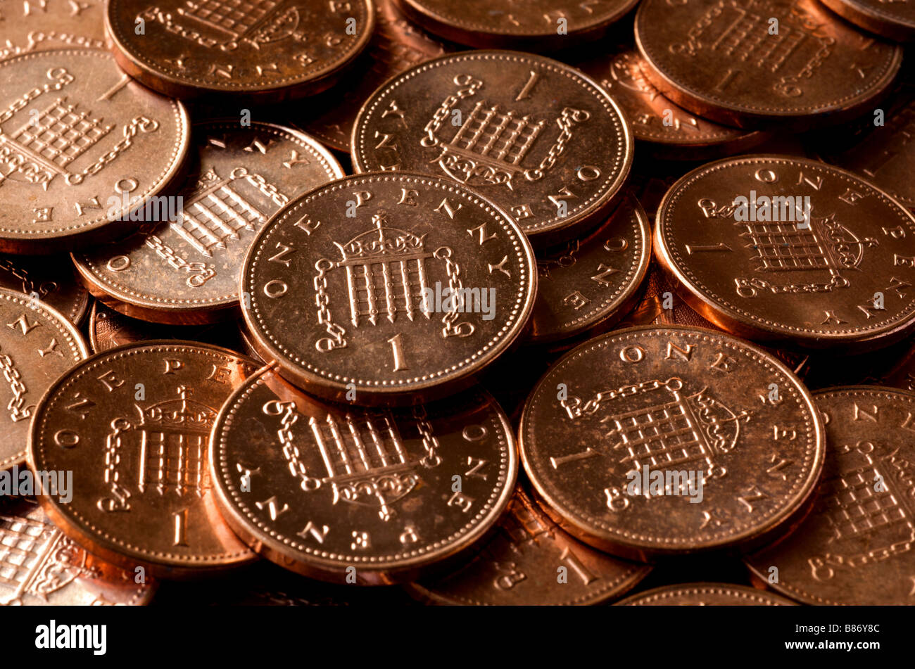 Las monedas de un centavo británico Foto de stock