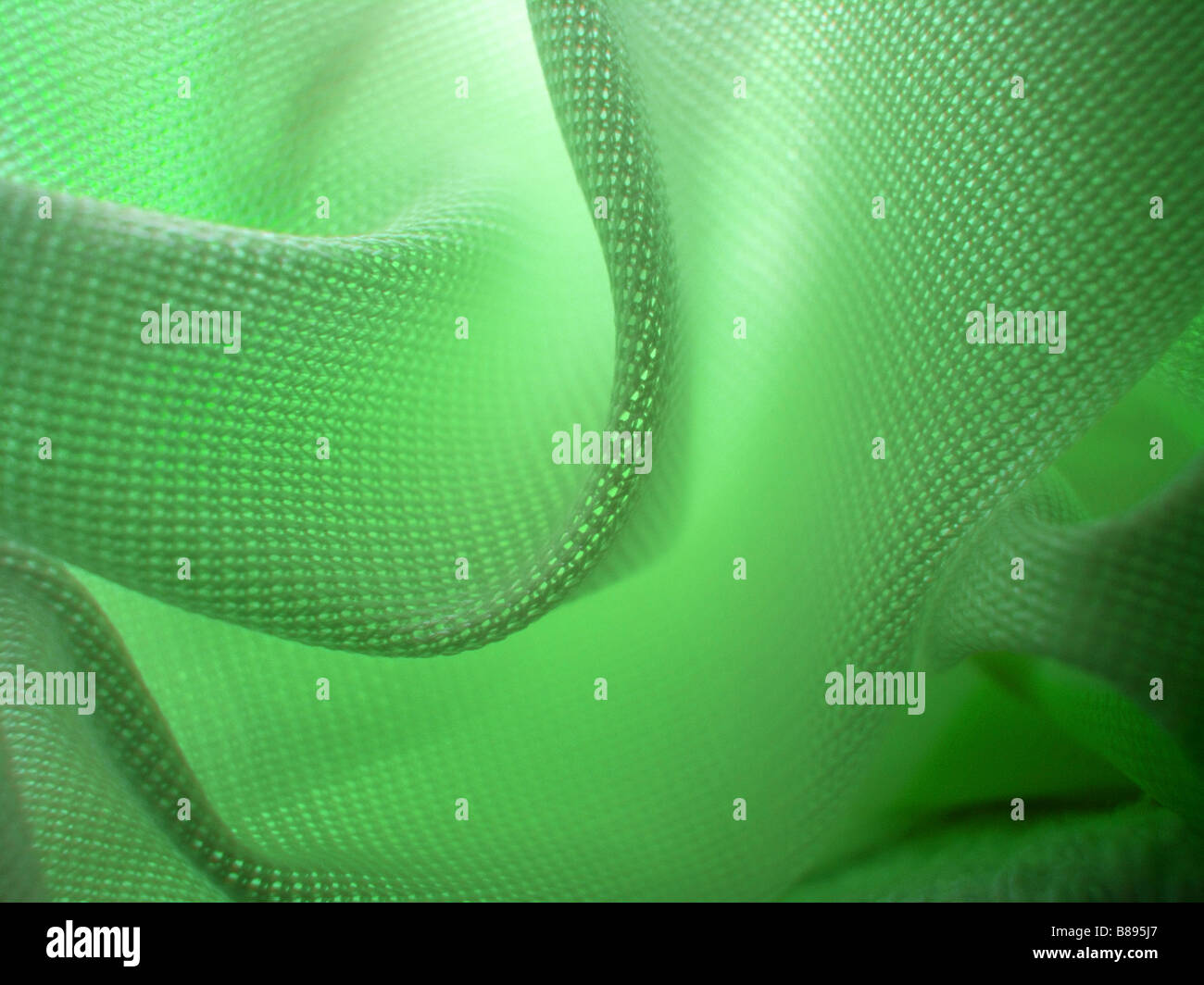 Macro de tela verde de abstracción Foto de stock
