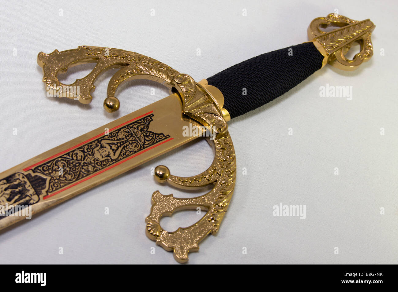 Los detalles de la espada de oro mango Fotografía de stock - Alamy
