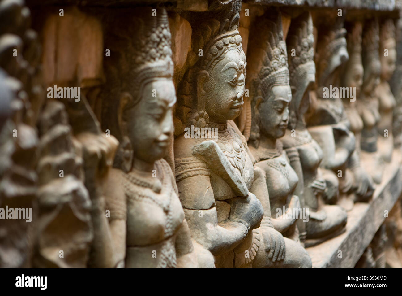Esculturas en las paredes fotografiados en la Terraza del Rey Leproso, la ciudad de Angkor Wat Camboya Foto de stock