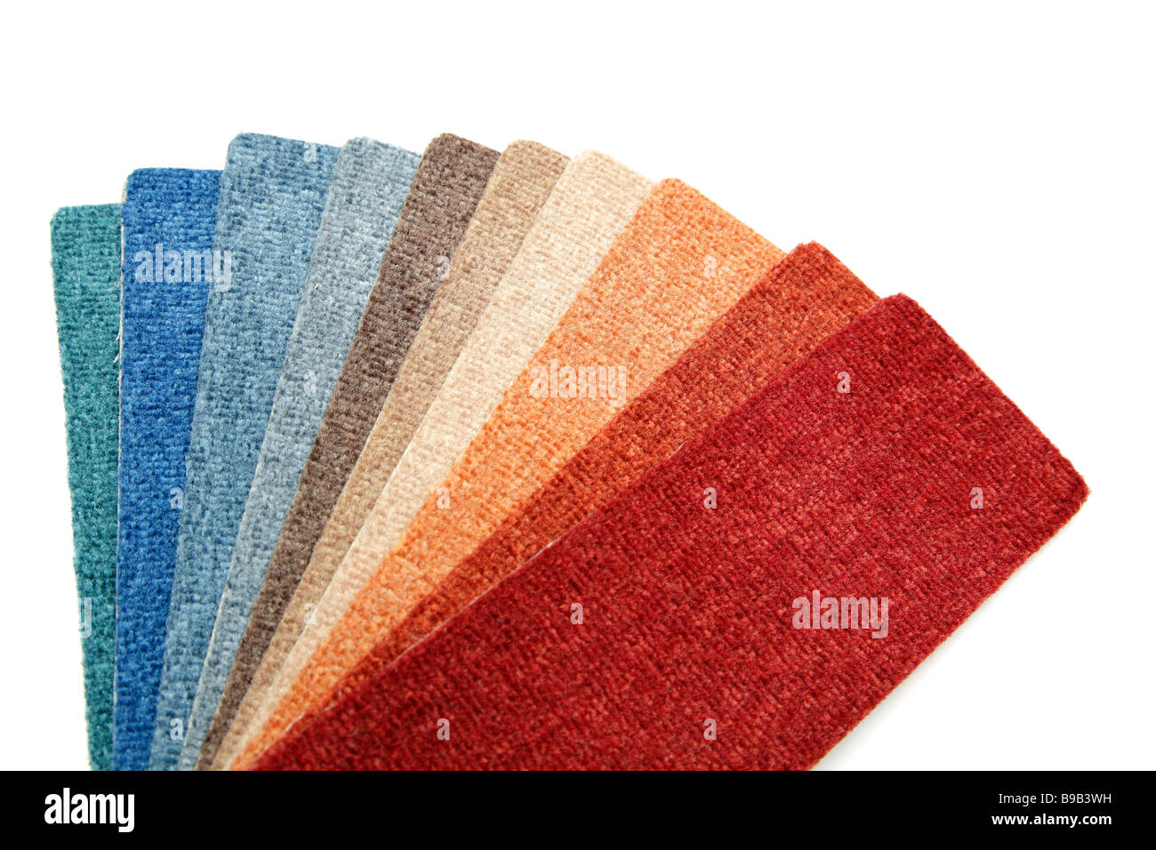 Las muestras de color de una alfombra que cubre en la tienda Foto de stock