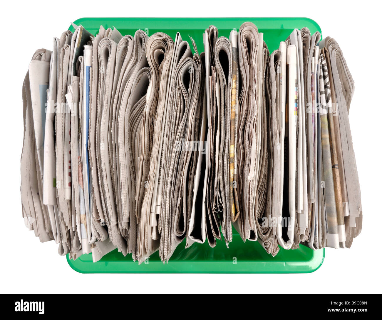 Periódicos viejos en la caja de reciclaje Foto de stock