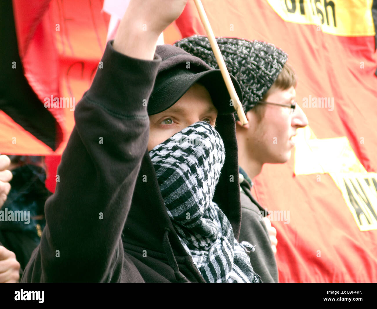 Manifestante en la marcha de protesta del G20 en Londres, 28/03/09. Foto de stock