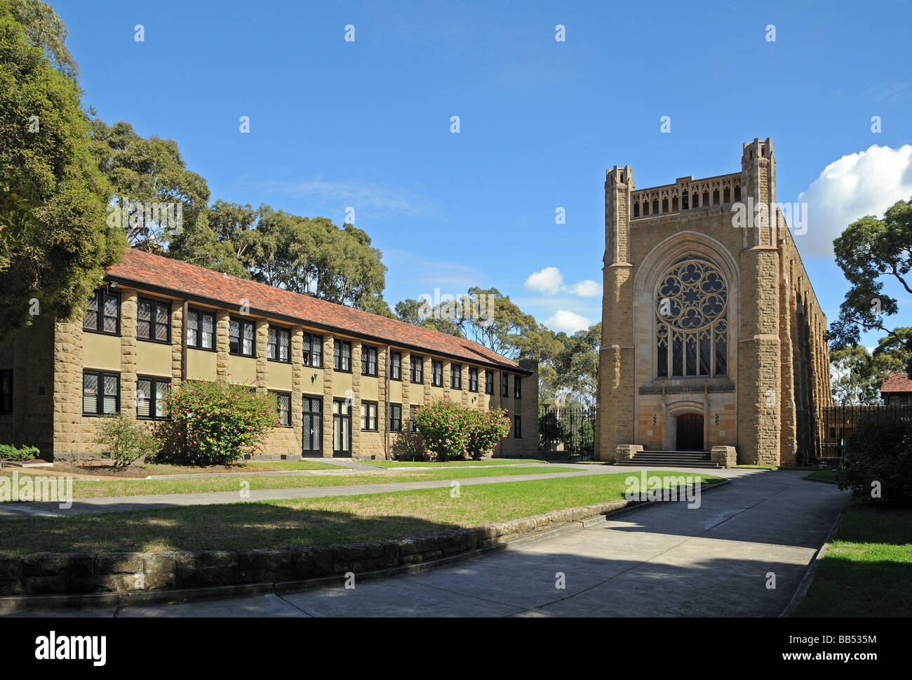 Newman College la calle Swanston Melbourne Australia universidad tradicional edificio victoriano de piedra edificio de estilo colonial. Foto de stock