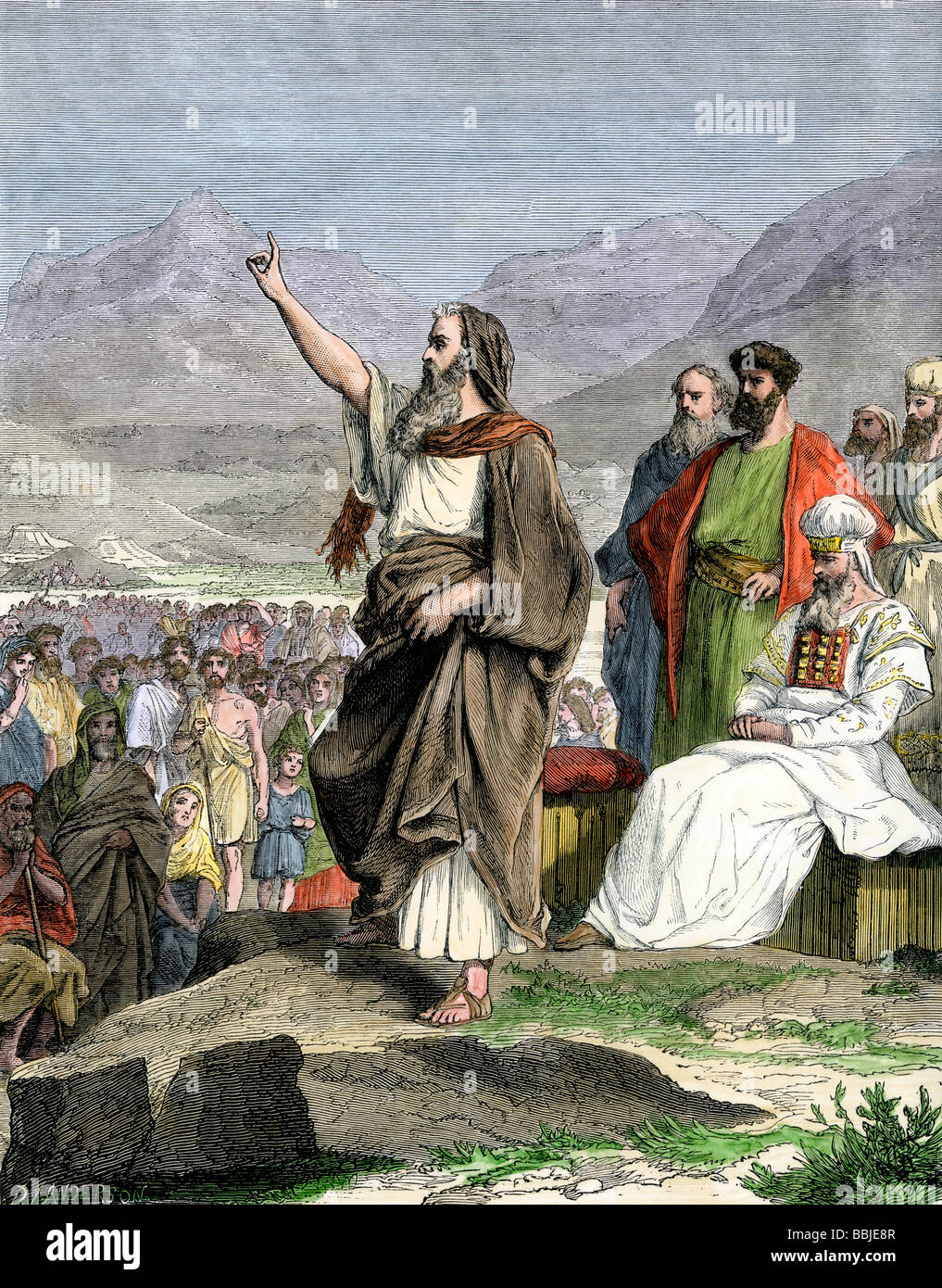 Moisés dando las leyes para el pueblo hebreo durante el Éxodo. Xilografía  coloreada a mano Fotografía de stock - Alamy