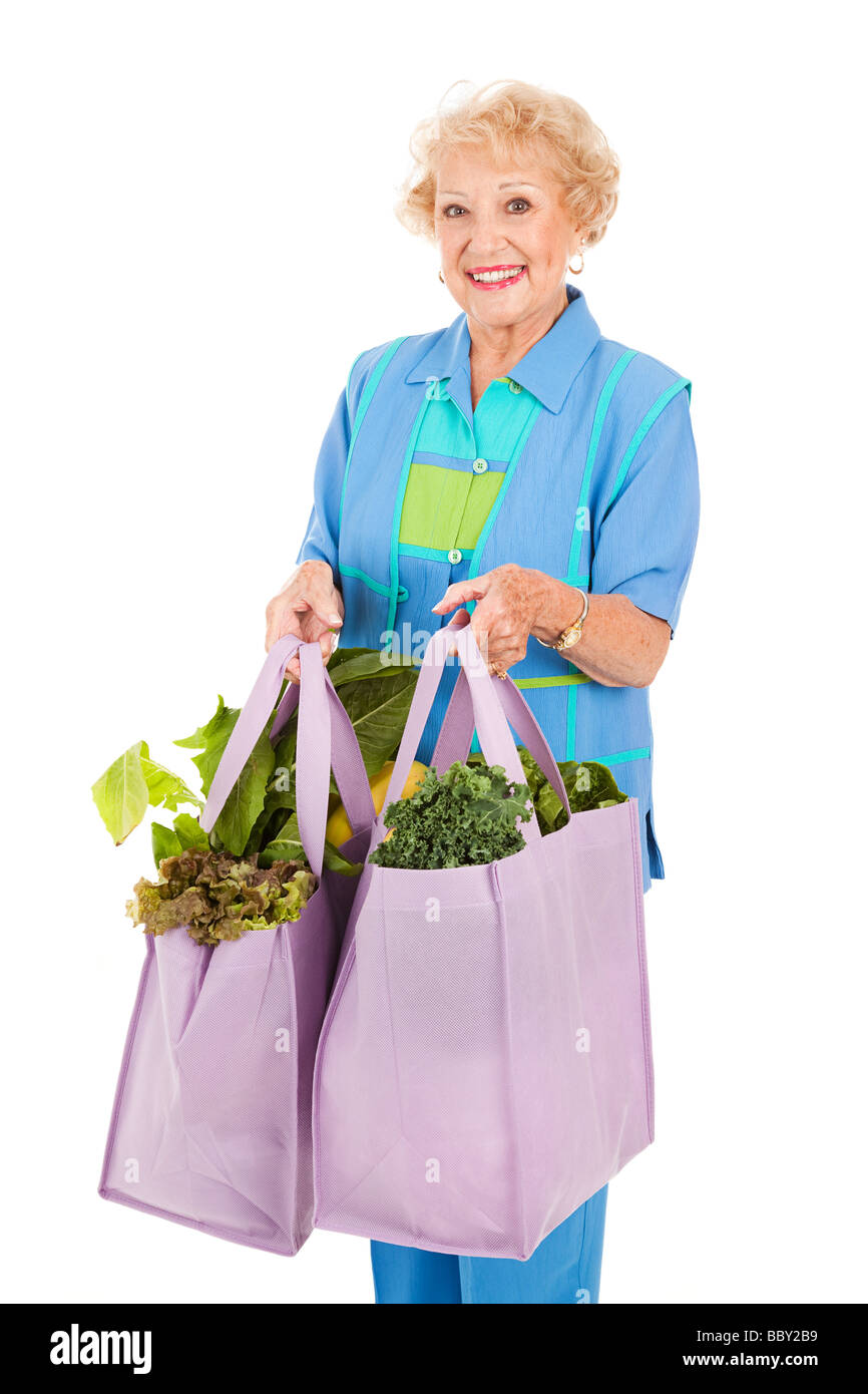 Mujer recibiendo una bolsa de comida entregada