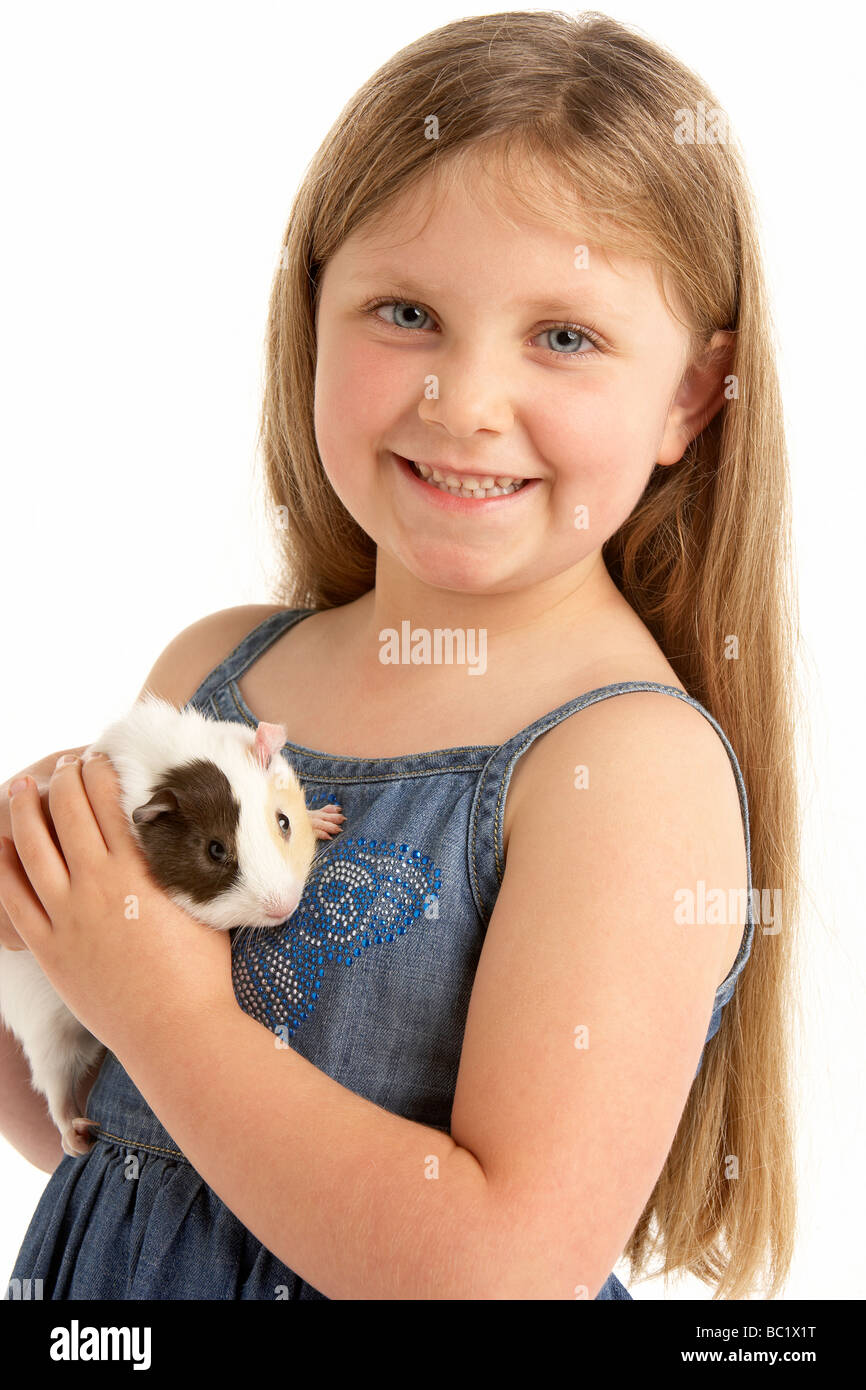 Joven Chica sujetando el Pet Cuy Foto de stock