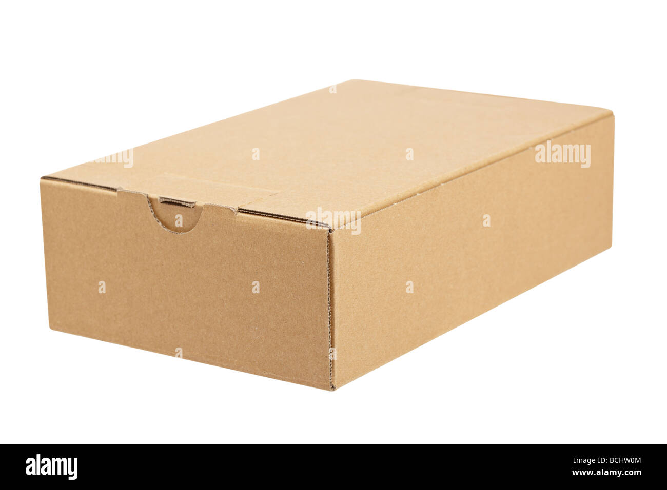 Una caja de cartón aislado sobre fondo blanco, profundidad de campo Foto de stock
