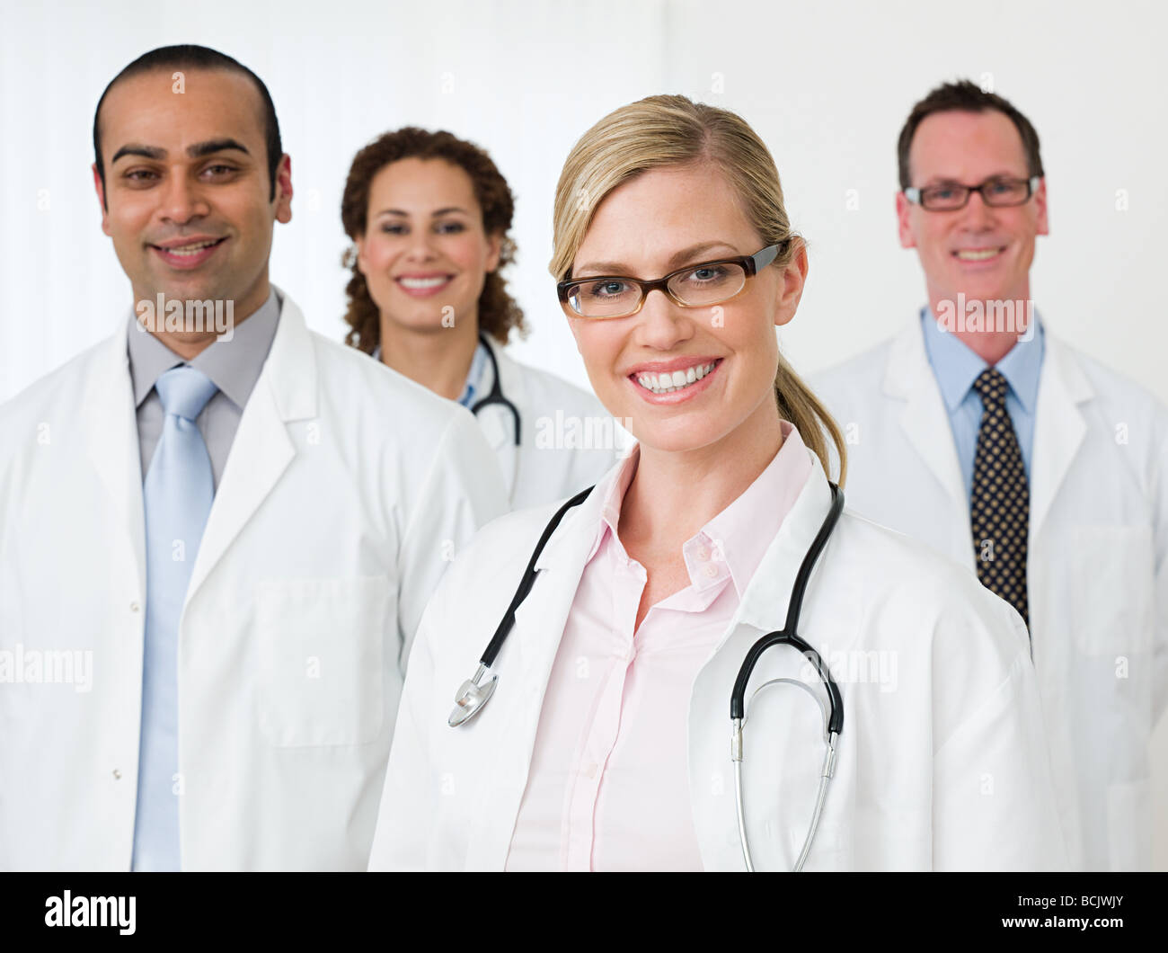Cuatro médicos Foto de stock