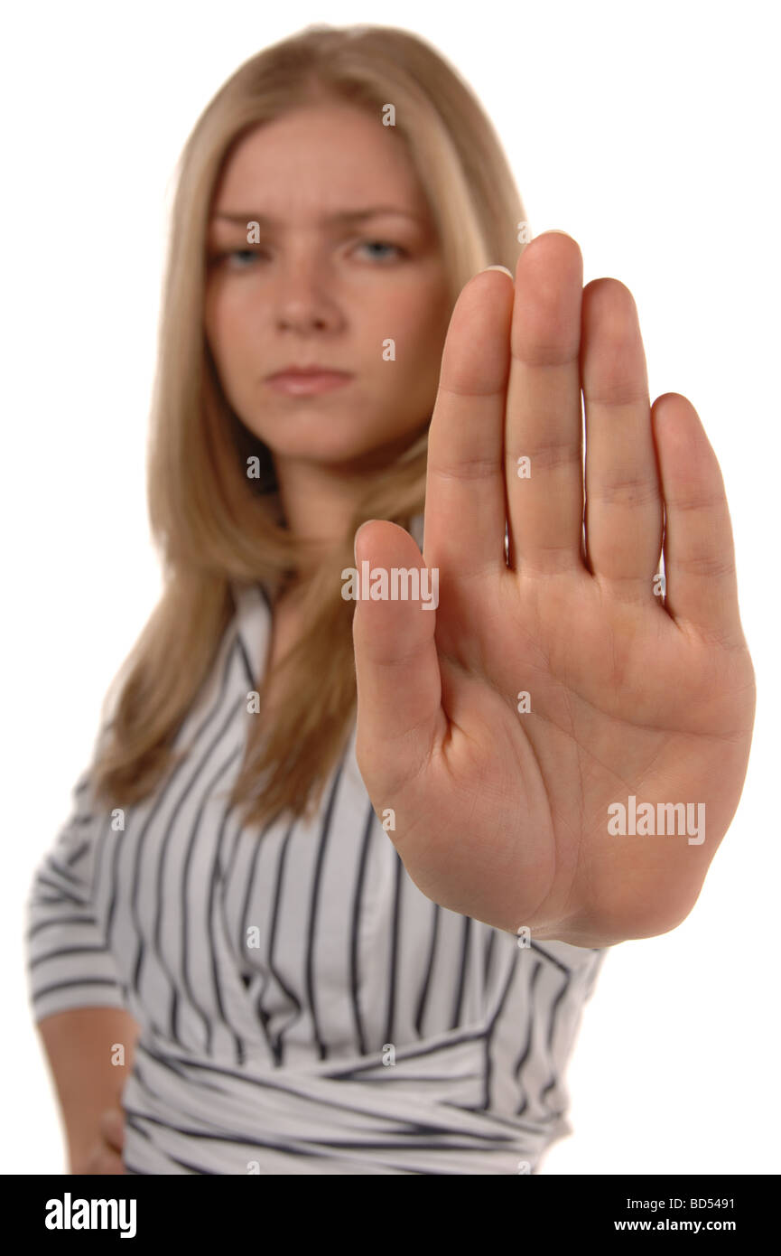 Las mujeres de negocios con la mano diciendo dejar aislado en blanco Foto de stock