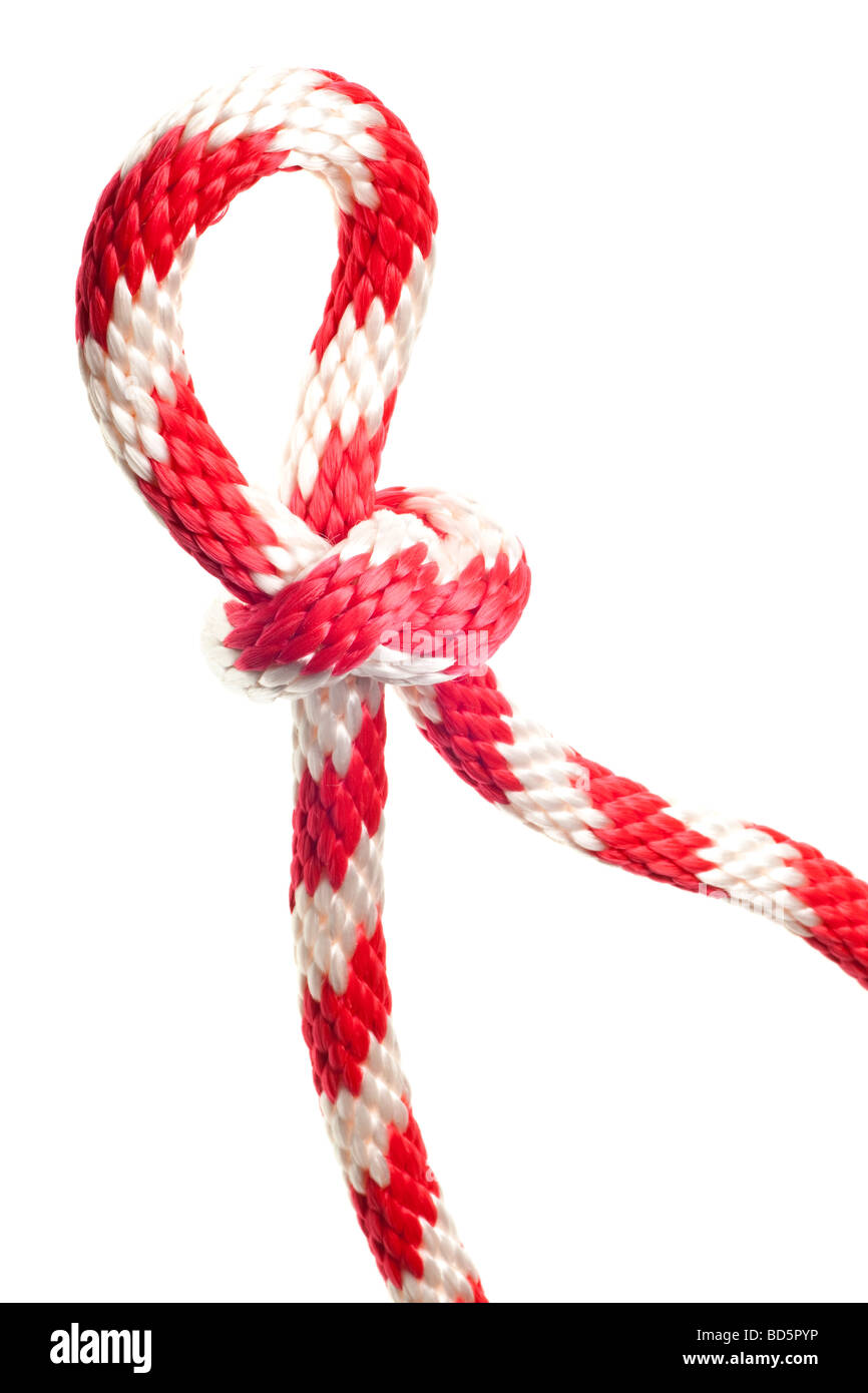Cuerda de nylon rojo y blanco aislado en un fondo blanco puro Foto de stock