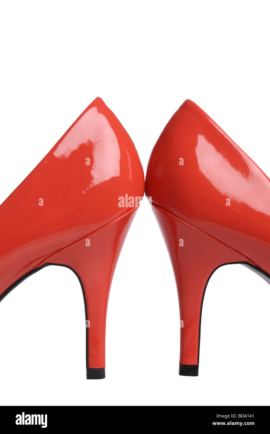 Zapatos de Tacón rojo sobre fondo blanco. Foto de stock
