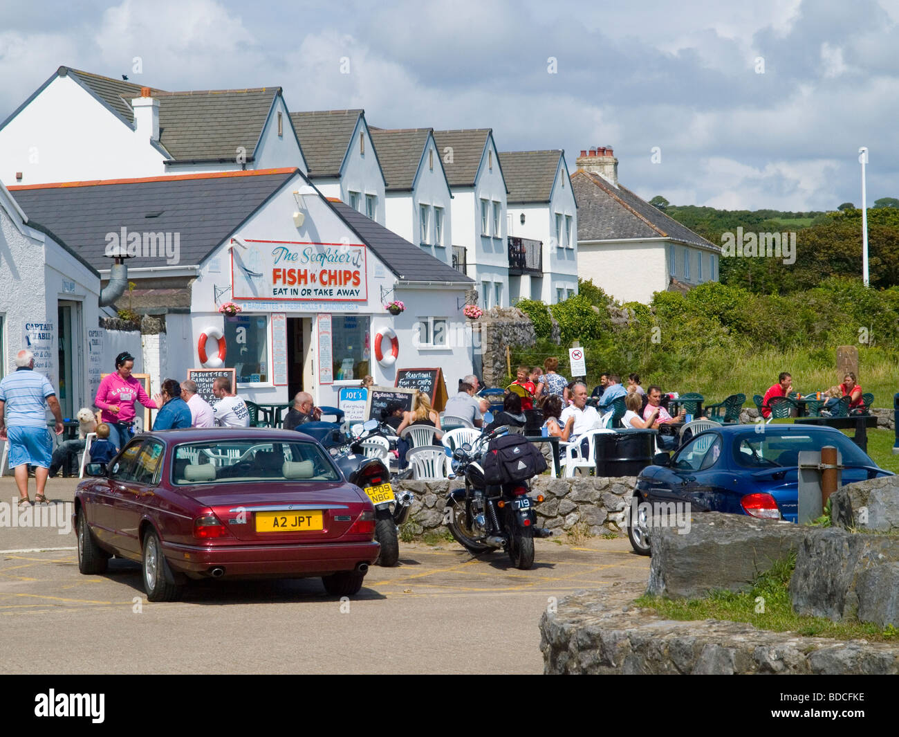Fuera de la tienda de fish and chips en Port Eynon, Península de Gower Swansea Wales UK Foto de stock