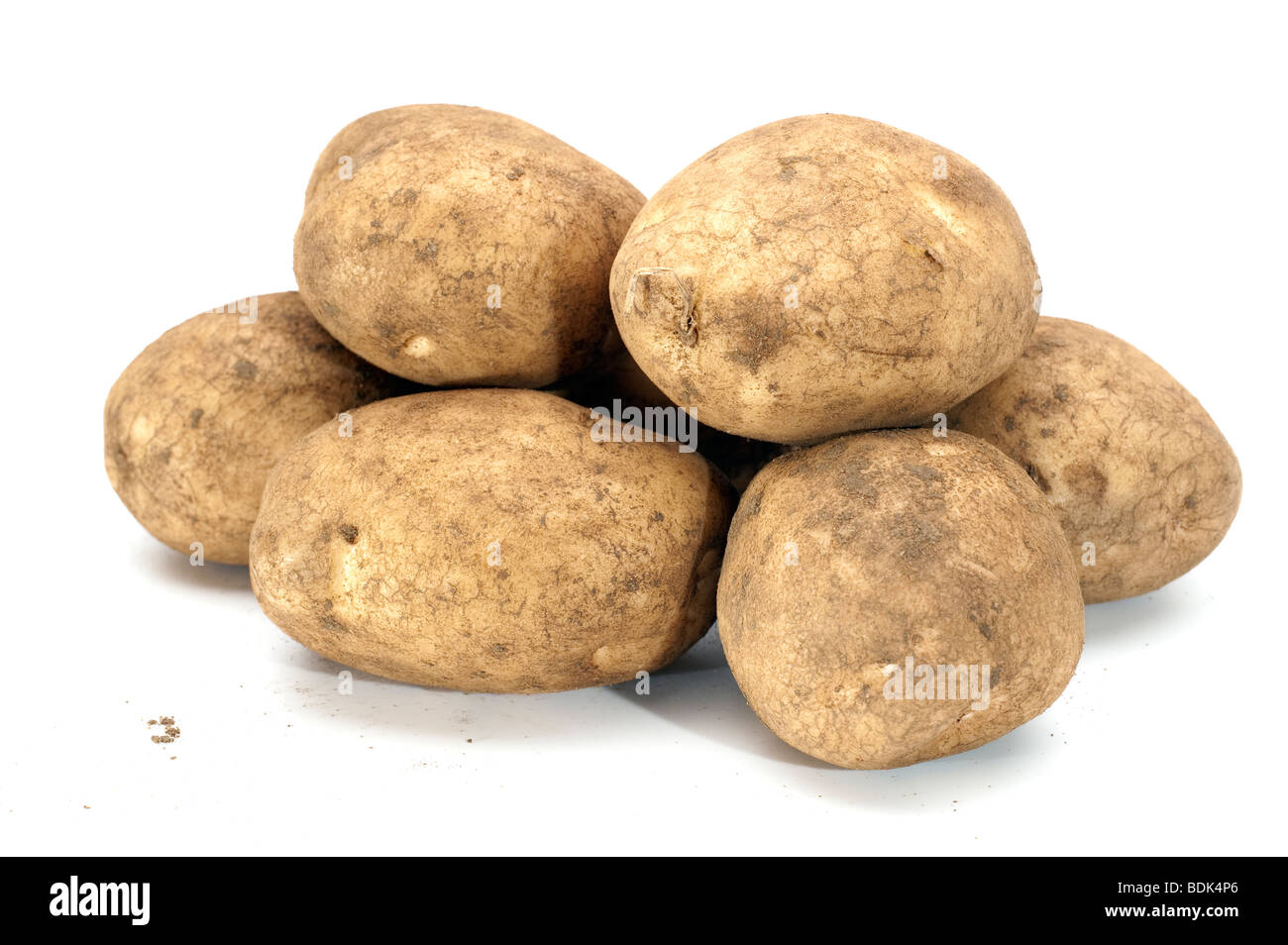 Montón de patatas sucias Foto de stock
