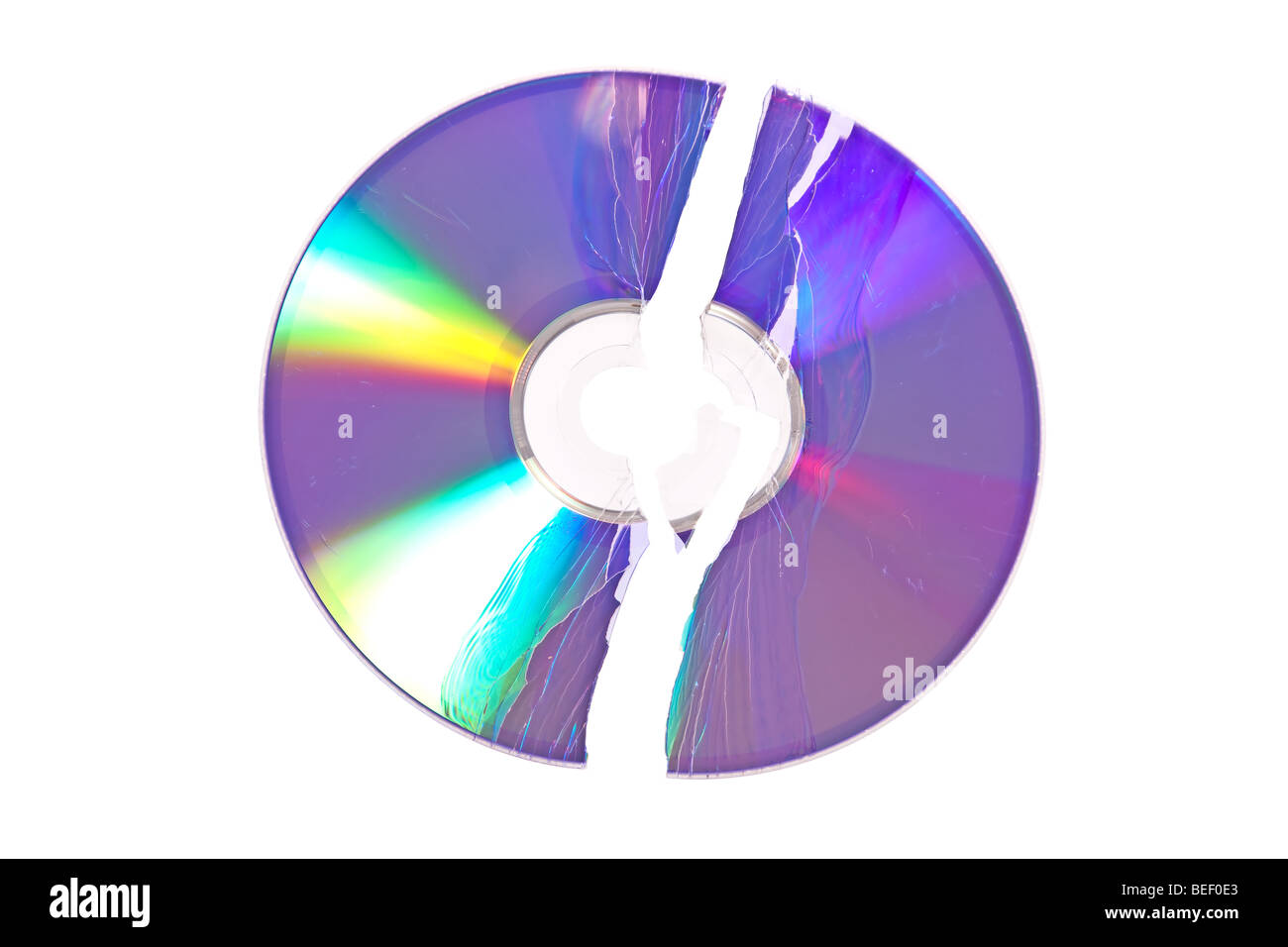 DVD / CD destrozado aislado sobre un fondo blanco. Foto de stock