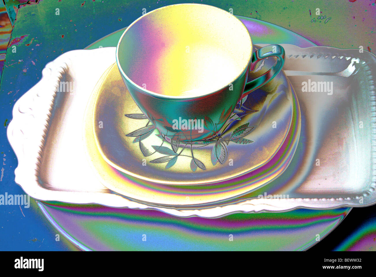 Colourised vintage cup, platillo y placas Foto de stock