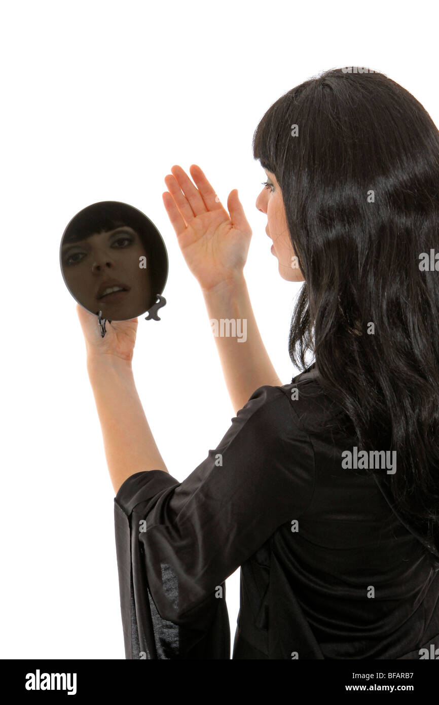 Adivino con espejo negro Fotografía de stock - Alamy