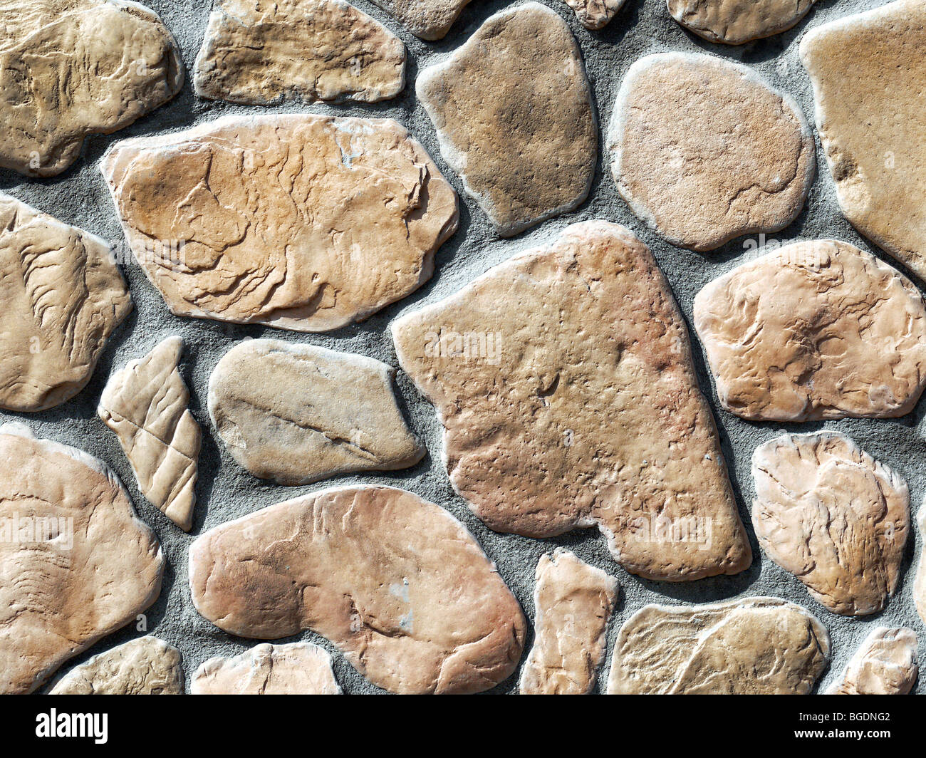 Closeup shot de pared de la casa hecha de bloques de piedra Foto de stock