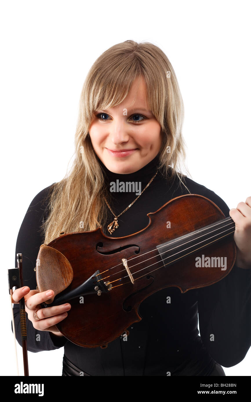 Retrato de una joven violinista. Aislado sobre fondo blanco. Foto de stock