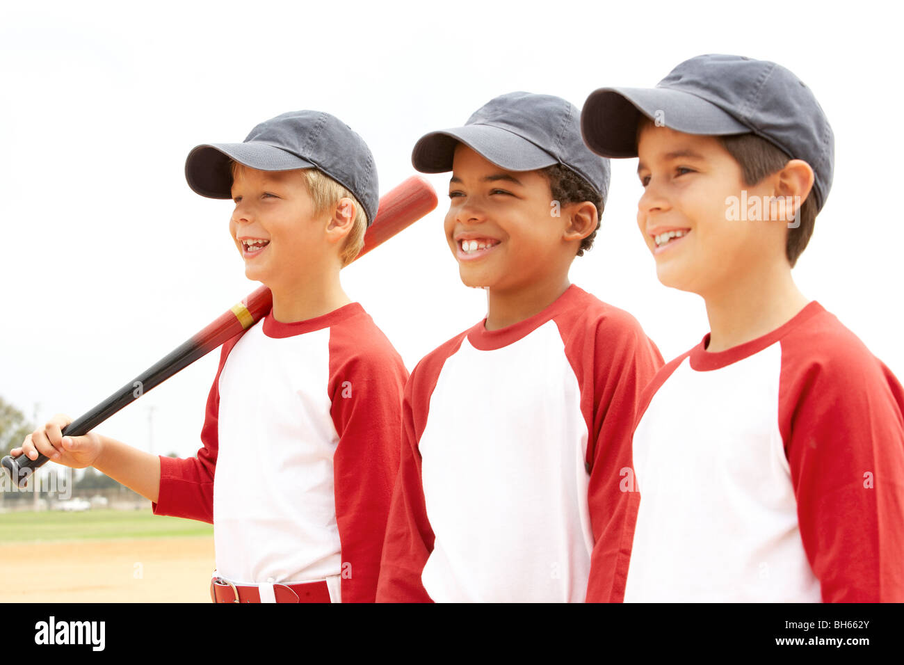 Los muchachos en el equipo de béisbol Foto de stock