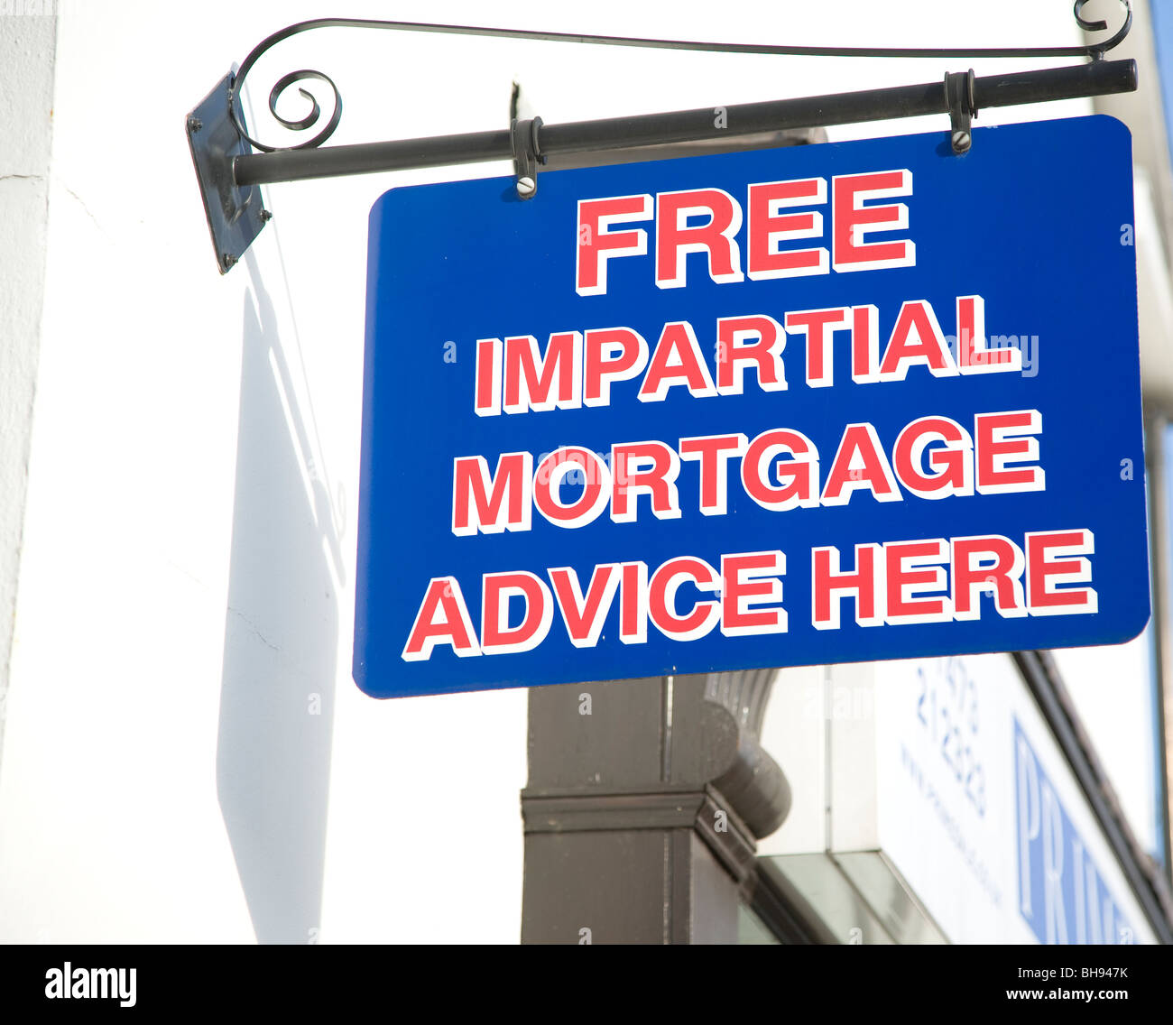 Signo publicidad gratuita imparcial asesoramiento hipotecario aquí Foto de stock