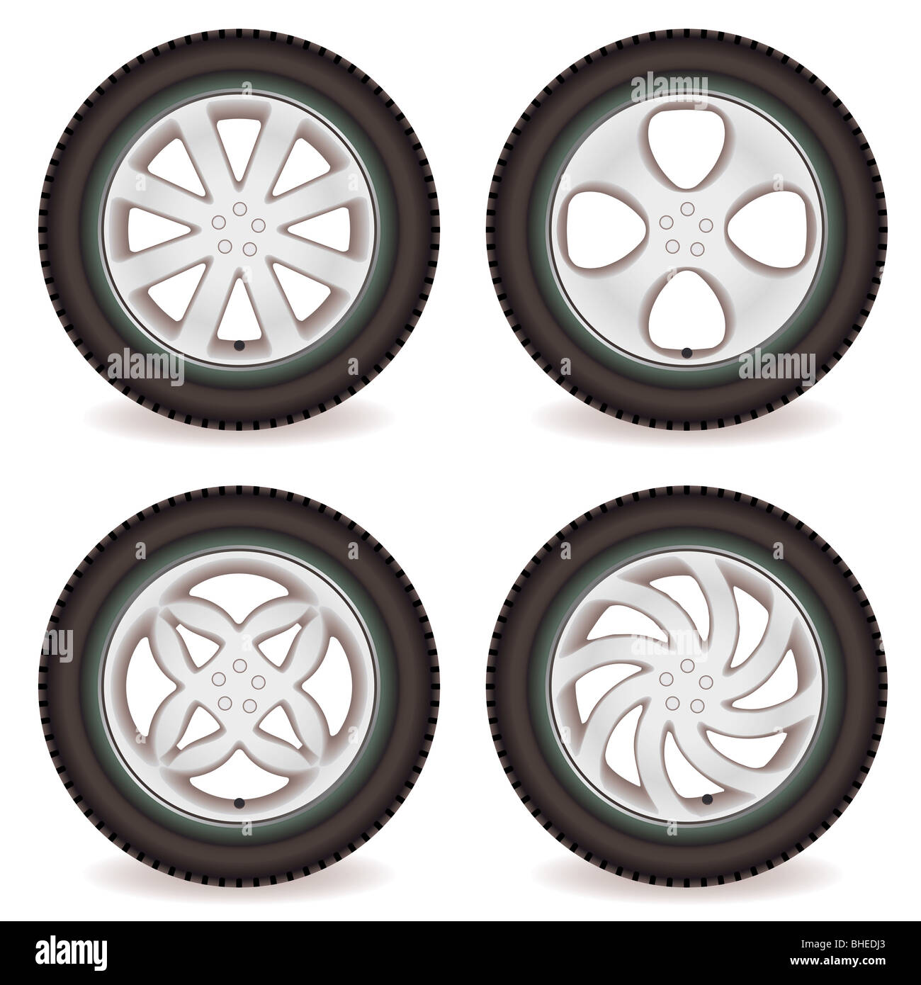 Cuatro neumáticos con llantas de aleación de diseños diferentes Fotografía  de stock - Alamy