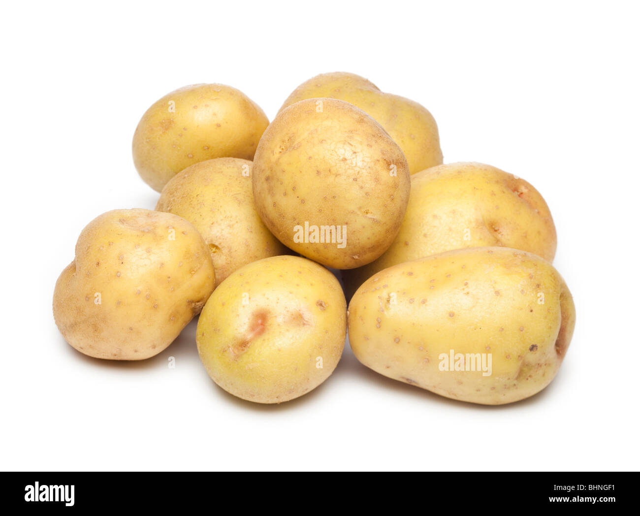 Patatas sobre fondo blanco. Foto de stock