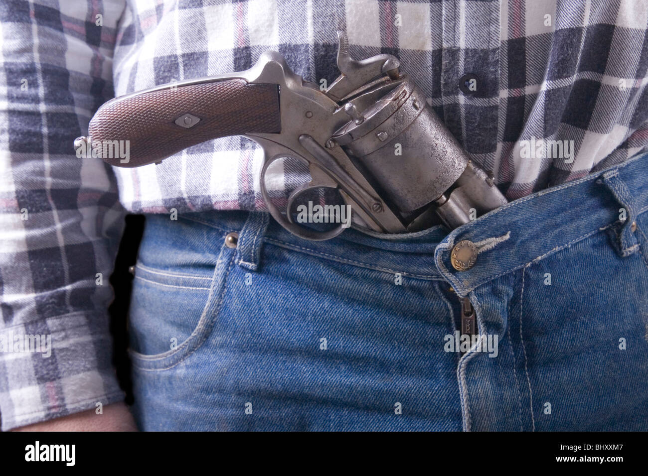 Hombre withs pistolas Foto de stock