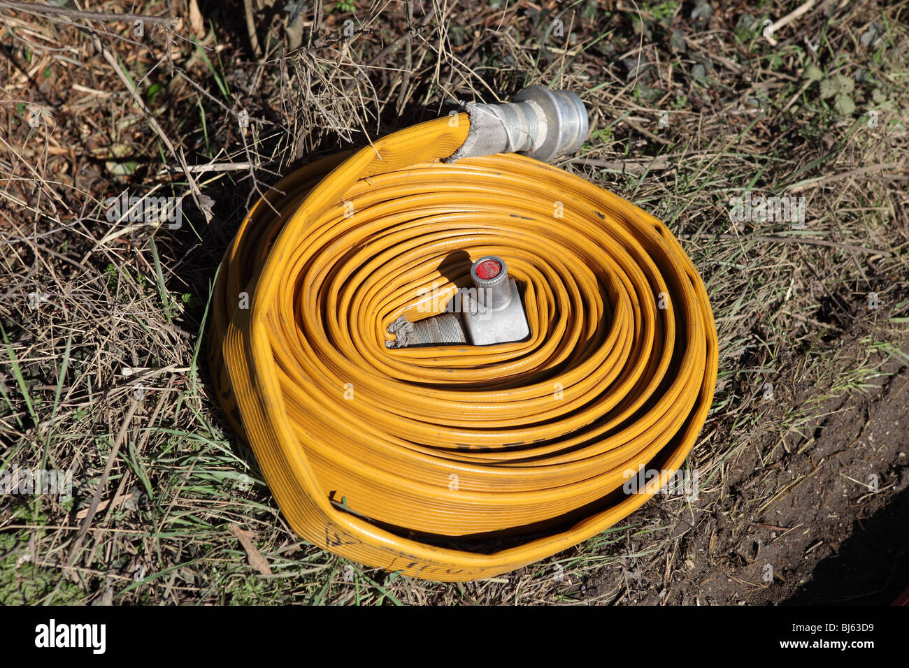 Manguera de incendios enrollada fotografías e imágenes de alta resolución -  Alamy