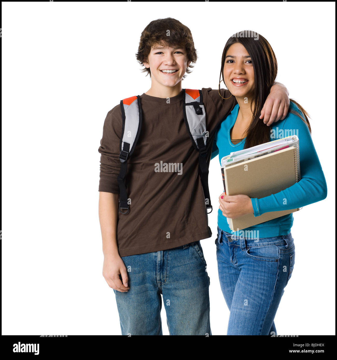 Los estudiantes con mochilas escolares posando Foto de stock