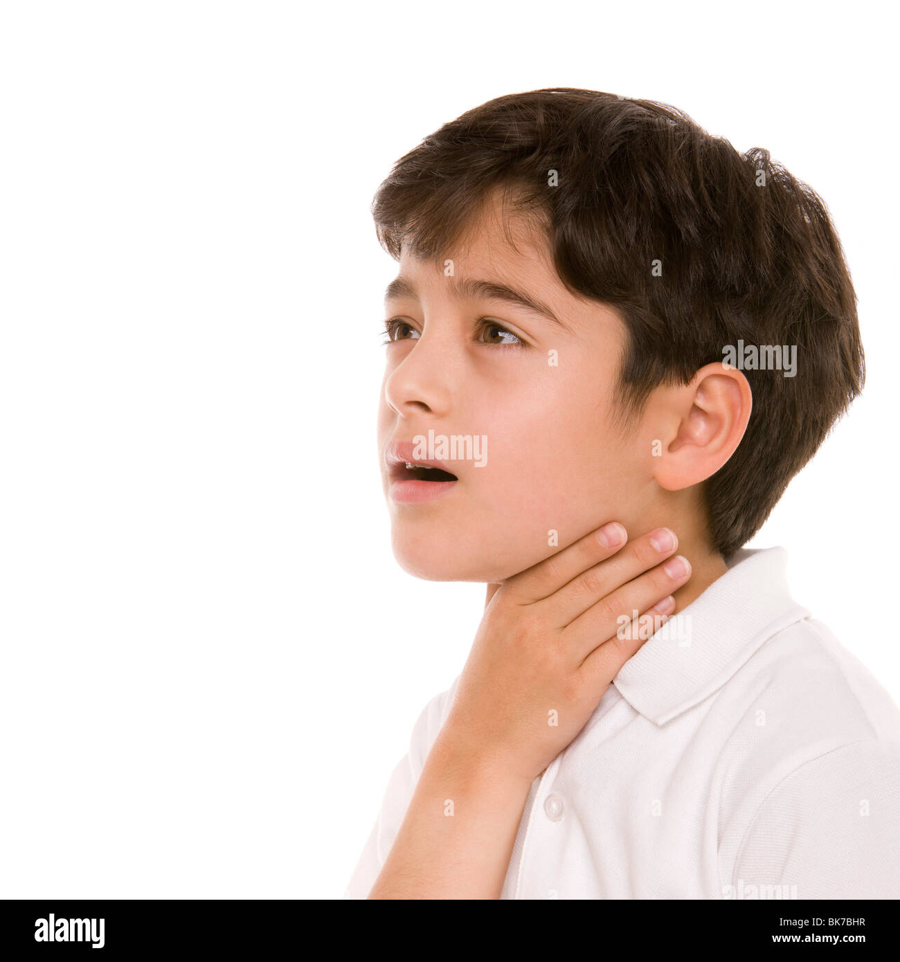 El niño con dolor de garganta Foto de stock