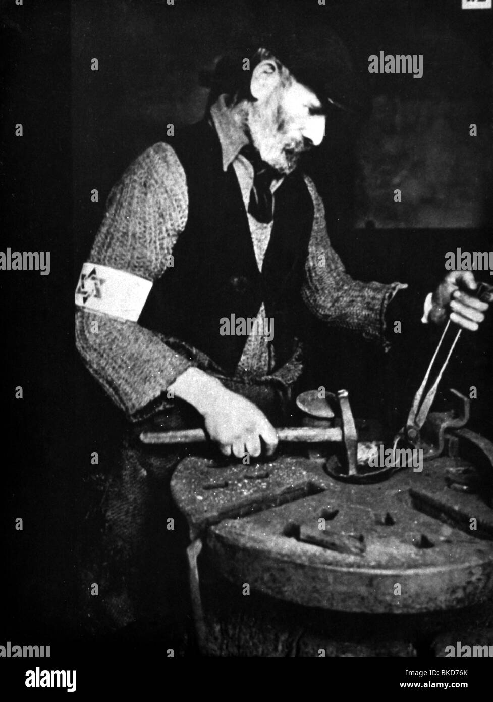Nazismo / nacionalsocialismo, crímenes, persecución de judíos, Gueto Warzawa, smith durante el trabajo, alrededor de 1941, Foto de stock
