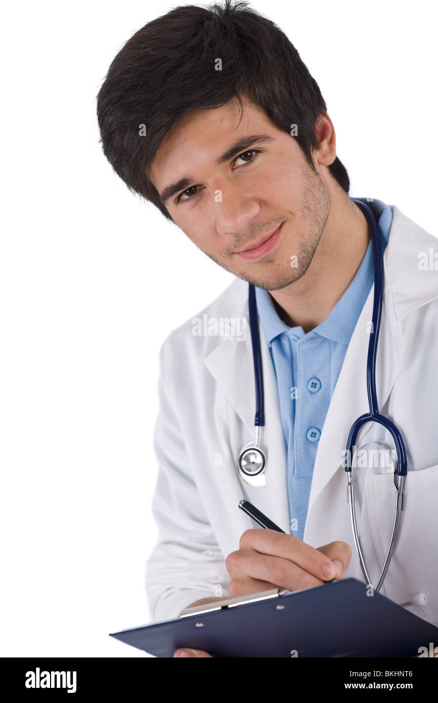 Estudiante varón médico con estetoscopio escrito sobre fondo blanco. Foto de stock