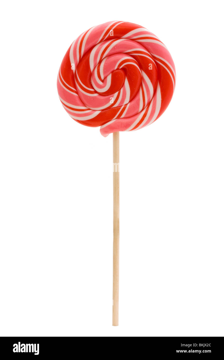Pink lollipop aislado sobre un fondo blanco. Foto de stock