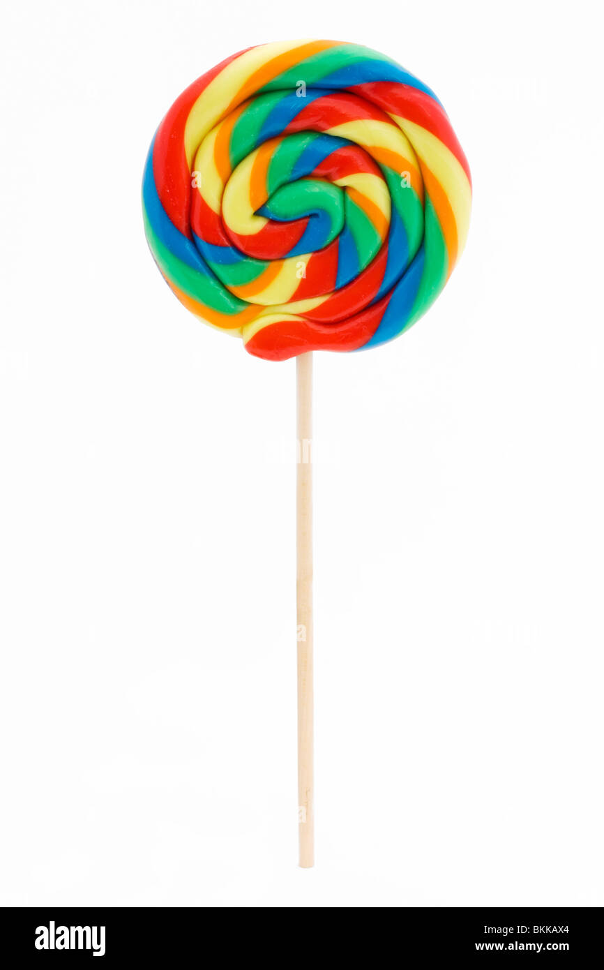 Rainbow lollipop aislado sobre un fondo blanco. Foto de stock