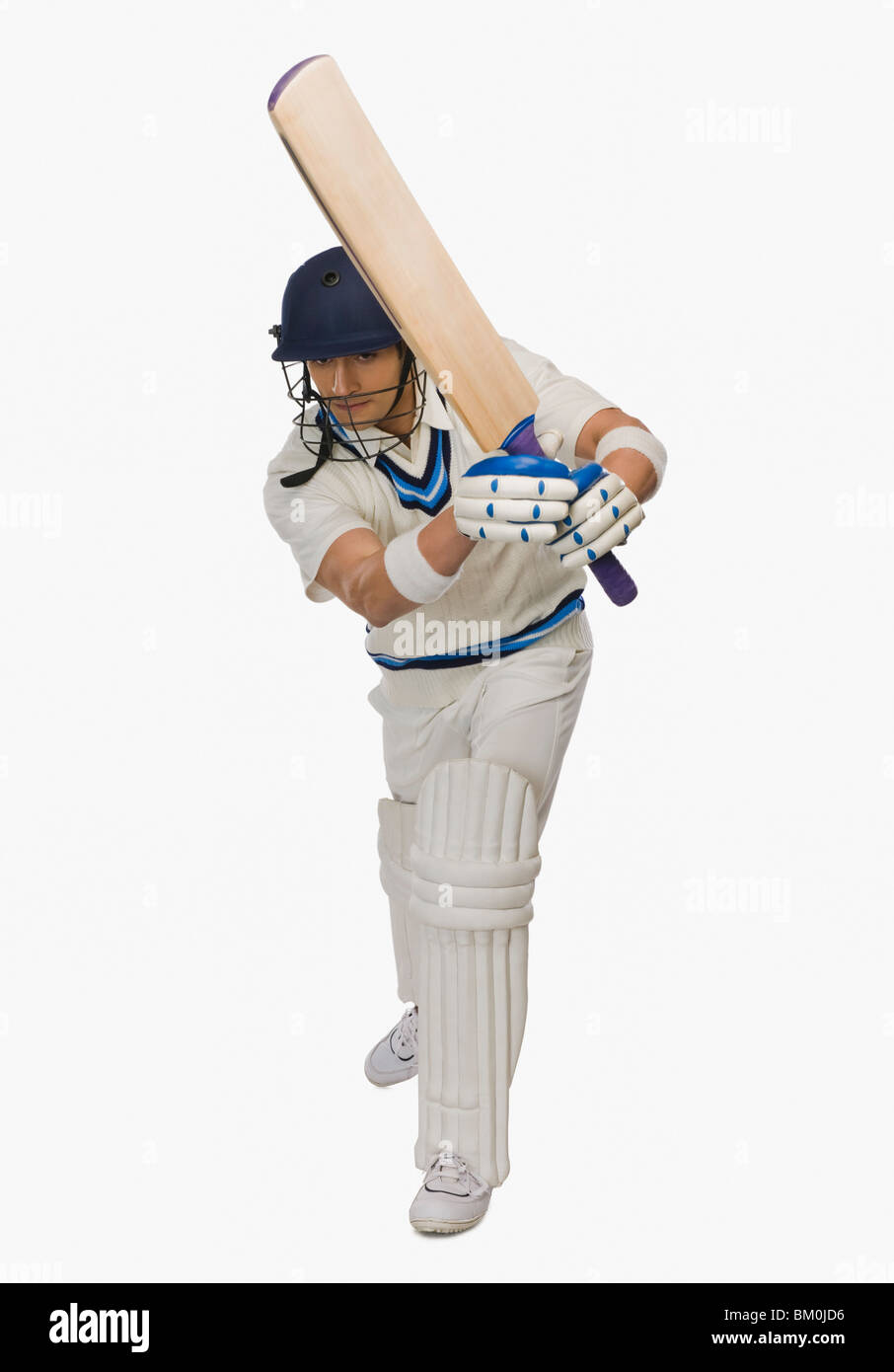 Bateador de cricket jugar shot Foto de stock