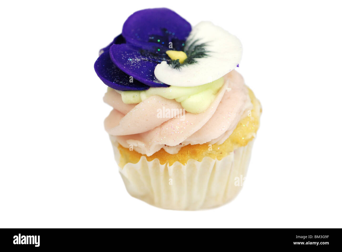 Cupcake aislado en blanco Foto de stock