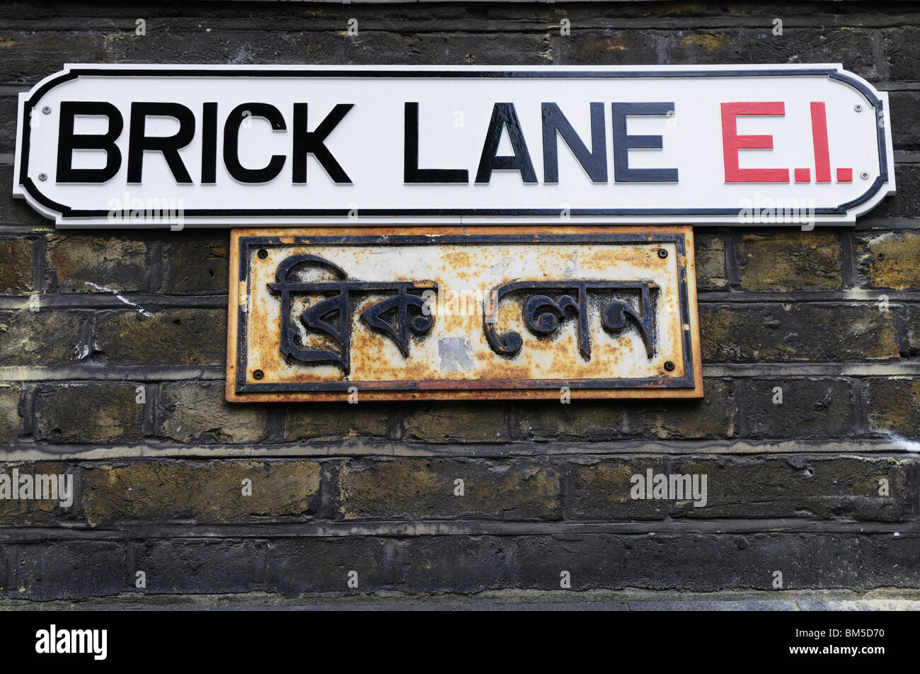 Brick Lane bilingüe E1 calle signo, Londres, Inglaterra, Reino Unido. Foto de stock