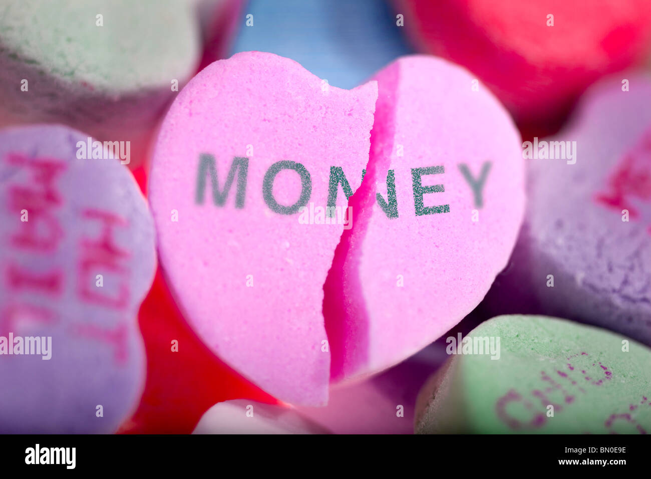 Dinero vs amor Foto de stock