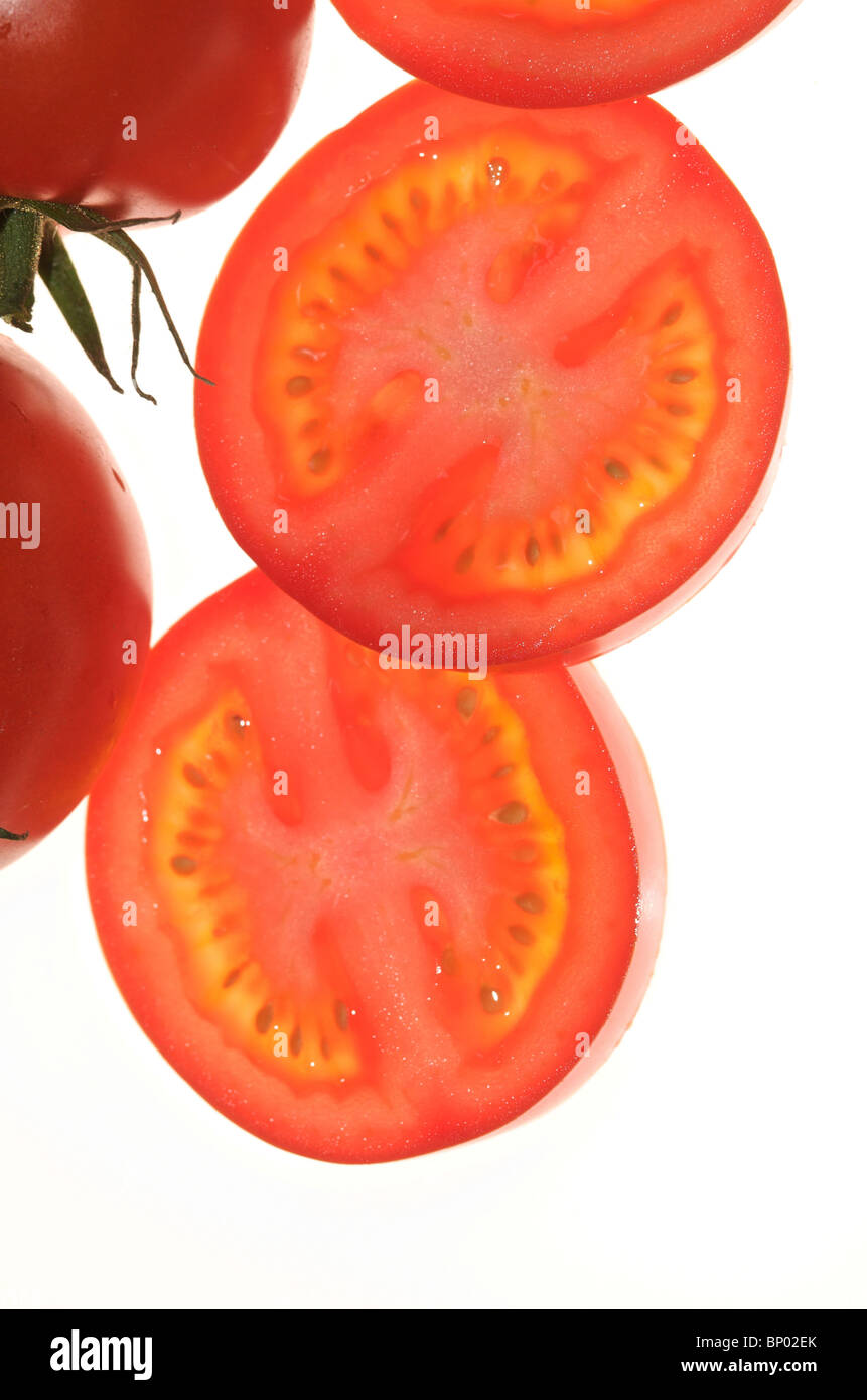 Imágenes de corte de tomate. Foto de stock