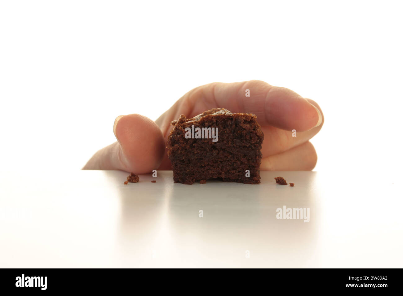 Furtivamente el último trocito de Brownie de chocolate Foto de stock