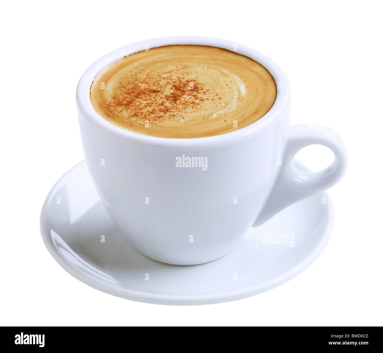 Taza de café con crema y canela Foto de stock