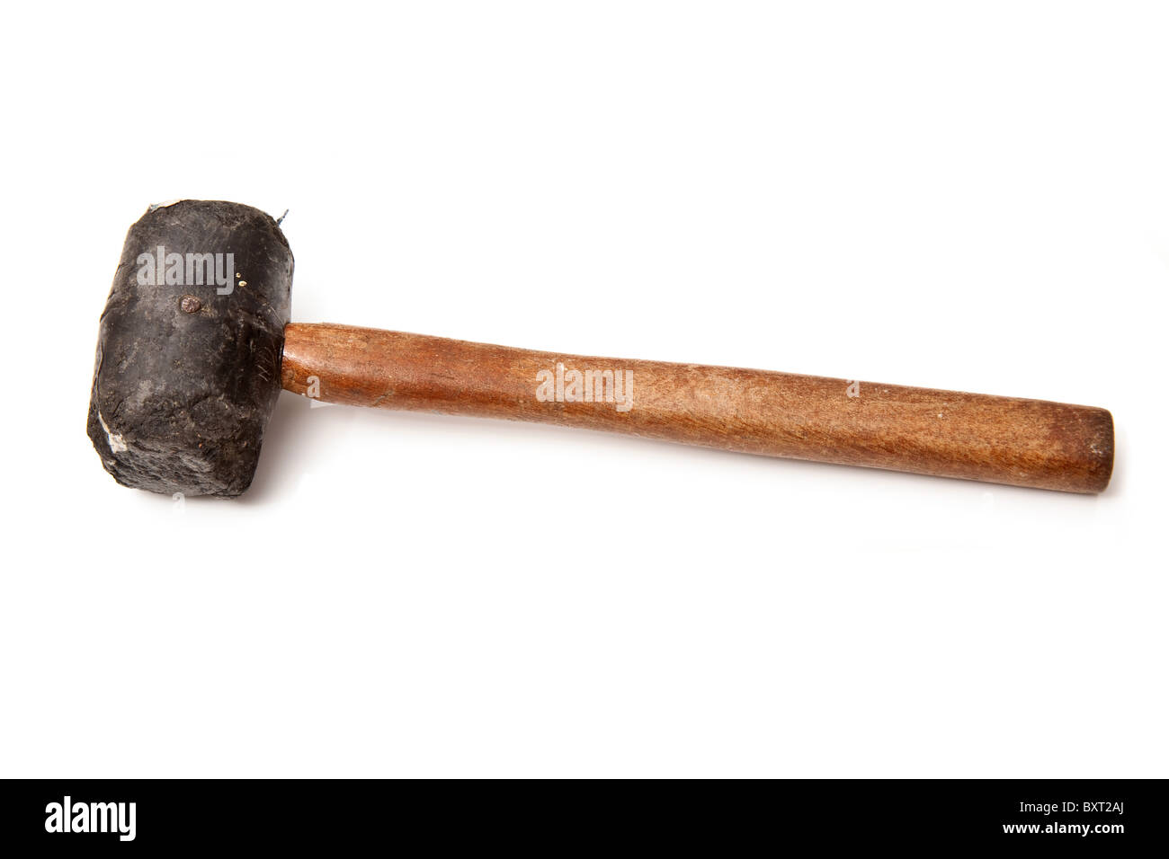 Mazo de goma o un martillo aislado sobre un fondo blanco studio. Foto de stock