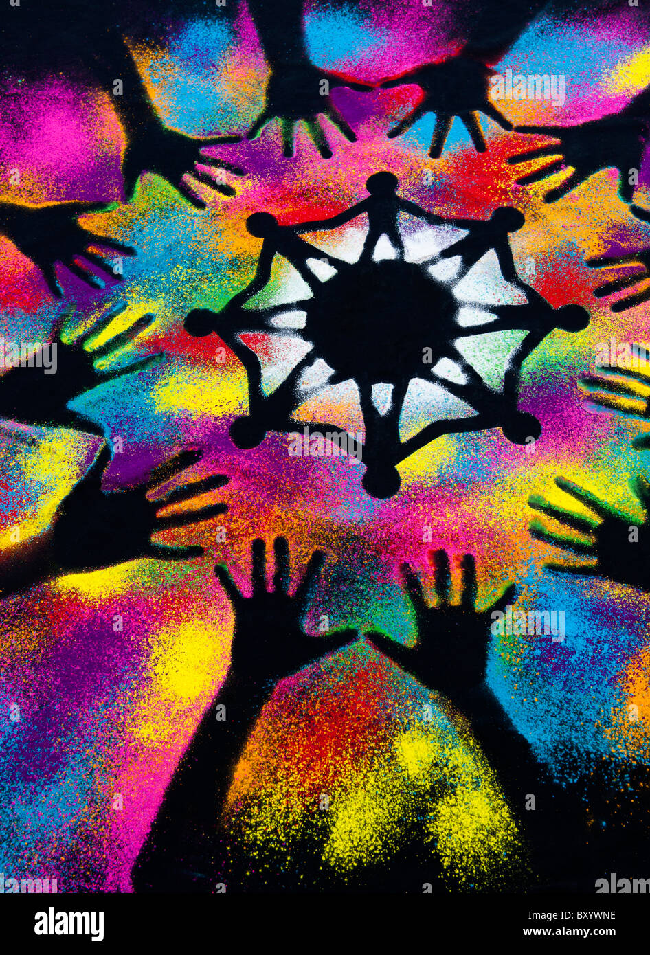 Un símbolo de unidad mundial rodeado por mano infantil impresiones realizadas con polvo multicolor Foto de stock