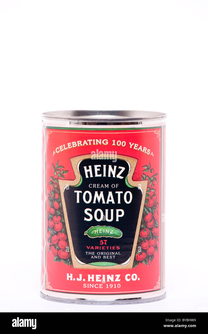 Una lata de Heinz crema de sopa de tomate sobre un fondo blanco. Foto de stock