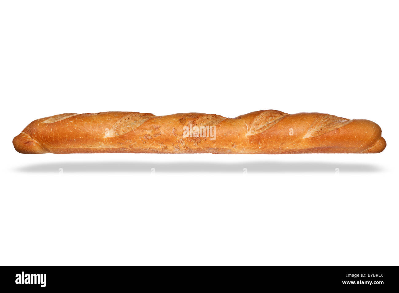 Foto de una hogaza de pan francés, aislado en un fondo blanco con sombra flotante. Foto de stock